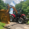 Precinct 1 Commissioner Chad LaPrade recently purchased a boom axe tractor to clear out the right-a-way and trim tree limbs back from the driving surfaces of county roads in his precinct.  Photo by Grand Saline Sun